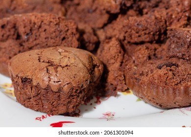 Failed Chocolate Muffins On A White Plate. Cooking Experience