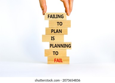 Failing to plan or planning fail symbol. Wooden blocks with words Failing to plan is planning to fail. White background, copy space. Businessman hand. Business, failing to plan planning fail concept.