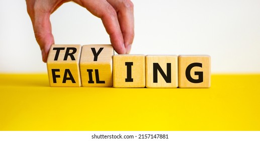 failing-trying-symbol-businessman-turns-wooden-stock-photo-2157147881