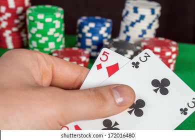 Failure In Poker, A Bad Card In Hand; Bluff; Chips In The Background