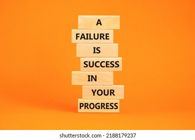 Failure or success symbol. Wooden blocks with words A failure is success in your progress. Beautiful orange background, copy space. Business, failure or success concept. - Shutterstock ID 2188179237