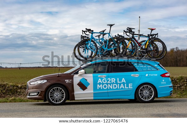 Fains-la-Folie, France -\
March 5, 2018: The technical car of AG2R La Mondiale Team driving\
on a country road after the passing of the peloton during the stage\
2 of Paris-Nice\
2018.