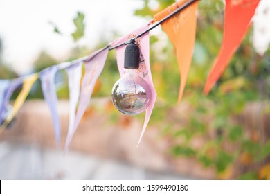 Fair Flag Bunting Colorful Background Hanging On Blue Sky For Fun Fiesta Party Event, Summer Holiday Farm Feast Celebration, Carnival Festival Event, Park Or Street Festa Design Decoration