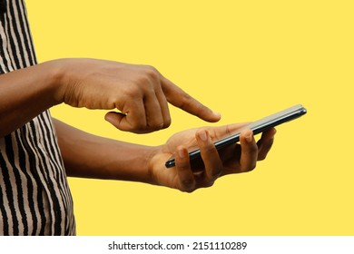 fair hand holding phone and touching screen, mockup, mask, crop, hand touching phone screen on yellow background