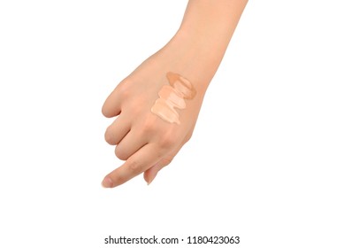 Fair, Medium, Dark Swatches  Of Foundation On The Hand Isolated On White.