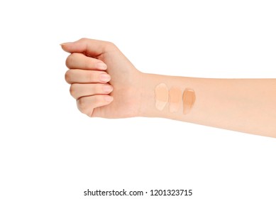 Fair, Medium, Dark Swatches  Of Foundation On The Hand Isolated On White.