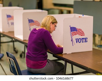 FAIRFAX COUNTY, VIRGINIA, USA - NOVEMBER 4, 2008: Woman voter at polls during presidential election.