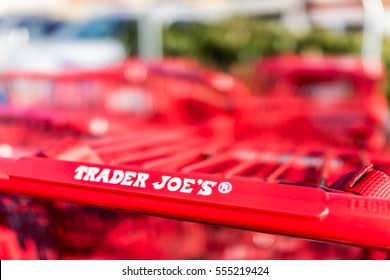 Fairfax, USA - December 15, 2016: Red Shopping Carts With Trader Joes Store Sign On Handle