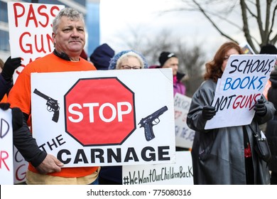 Fairfax, VA - December 14, 2017: Protesters Gather Outside Of The National Rifle Association Headquarters For A Vigil In Remembrance Of The 2012 Sandy Hook Elementary School Massacre In Newtown.