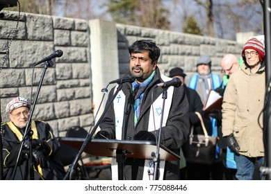 Fairfax, VA - December 14, 2017: Protesters Gather For A Vigil Outside Of The NRA On The Fifth Anniversary Of The Sandy Hook Elementary School Shooting In Newtown, Connecticut In 2012.