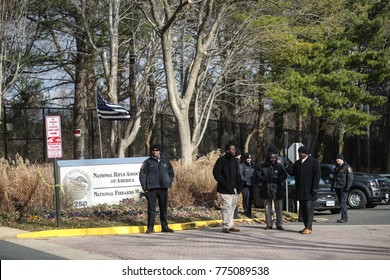 Fairfax, VA - December 14, 2017: Federal Police And National Rifle Association Officials Stand At The Entrance Of The NRA Headquarters On The Anniversary Of The Sandy Hook School Shooting In Newtown.