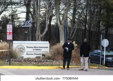 Fairfax, VA - December 14, 2017: Federal Police And National Rifle Association Officials Stand At The Entrance Of The NRA Headquarters On The Anniversary Of The Sandy Hook School Shooting In Newtown.