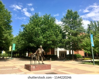 Fairfax, Virginia, USA - July 28, 2018: A Bronze Statue Honoring George Mason Is A Well-known Landmark To Students And Faculty On The Main Campus Of George Mason University.