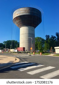 Fairfax, Virginia / USA - June 8, 2020: Cables Hang From A New Water Tank Under Construction On The Main Campus Of George Mason University.