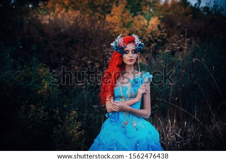 Fairy in the autumn forest