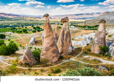 Fairy chimneys view near Cavusin Town in Cappadocia