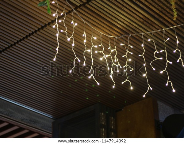 Fairy Lights Hanging On Ceiling Copy Stock Photo Edit Now