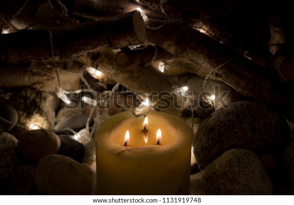Fairy Lights Wrapped Around Some Logs Stock Photo Edit Now