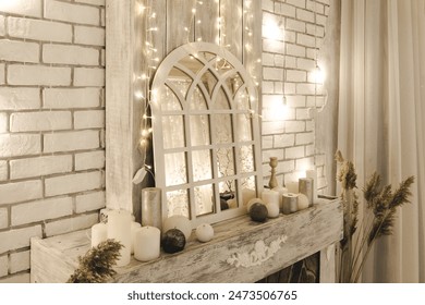 Fairy tale mirror with arched frame, surrounded by fairy lights and candles, set against a white brick fireplace. The warm light and wooden elements add magic and coziness to the interior - Powered by Shutterstock