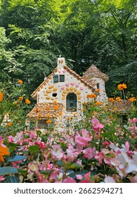 A fairytale house backdrop background picture with beautiful bright flowers