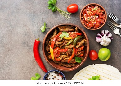 Fajitas With Beef Meat With Vegetables, Salsa Sauce And Tortilla. Traditional Mexican Food. Flat Lay, Overhead.