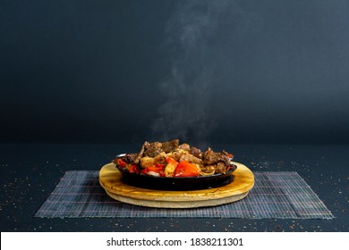 Fajitas Dish On Isolated Black Background