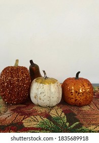 Fake fruit, fabric leaf pattern background.