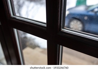 Fake hardwood imitation PVC door close up shot on a residential house.