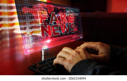 Fake news on computer screen. Broadcast, trolling, false information, hoax, propaganda, information and disinformation abstract concept 3d with glitch effect. Man typing keyboard.