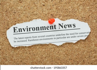 Fake Newspaper Clipping For An Environment News Headline Pinned To A Cork Notice Board