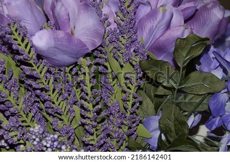 Fake purple flowers in a house