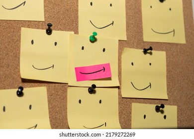 Fake Smile In Crowd Emotion Face Pin On Sticky Note On Cork Board Concept Using Sticky Notes