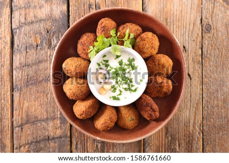 Similar – Foto Bild Falafel und Gemüse auf weißem Holzgrund