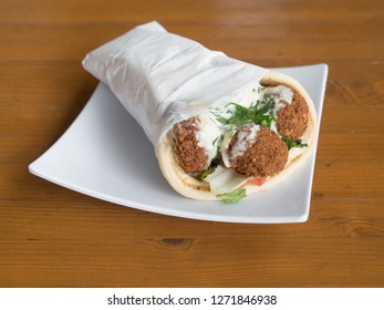 Falafel Gyro Served From A Mediterranean Food Cart In Portland, Oregon.