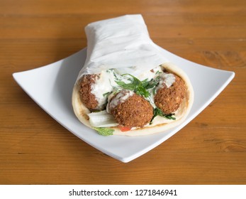 Falafel Gyro Served From A Mediterranean Food Cart In Portland, Oregon.