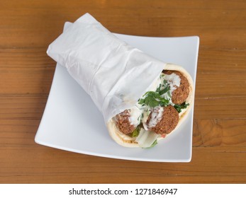 Falafel Gyro Served From A Mediterranean Food Cart In Portland, Oregon.