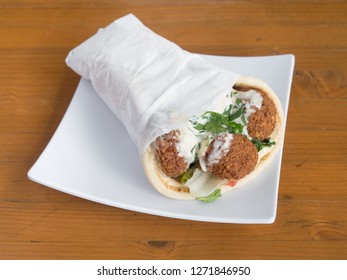 Falafel Gyro Served From A Mediterranean Food Cart In Portland, Oregon.