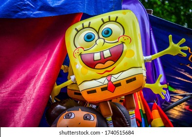Falcon Heights, Minnesota - August 20, 2018: Spongebob Squarepants balloon displayed as a carnival prize at a booth at the Minnesota State Fair