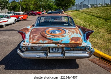 Falcon Heights, MN - June 19, 2022: High Perspective Rear View Of An Old 1960 Chrysler New Yorker 2 Door Hardtop At A Local Car Show.