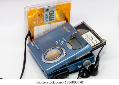 Falkirk / Scotland 12 December 2019 - Old Mini Disc Portable Player With Mini Discs 