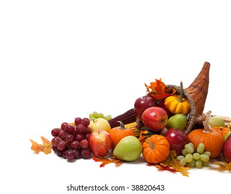 A Fall Arrangement In A Cornucopia On A White Background