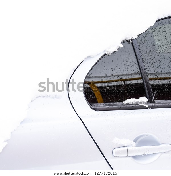 Fall asleep wet snow car. Snowfall of wet snow. Snow\
lying on the car.