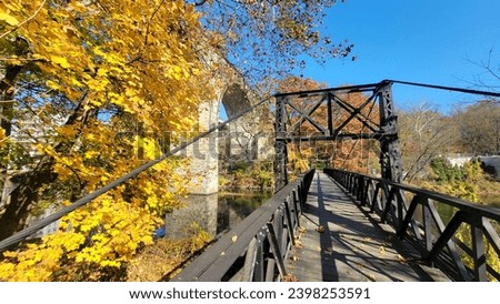 fall autumn black steel foot bridge