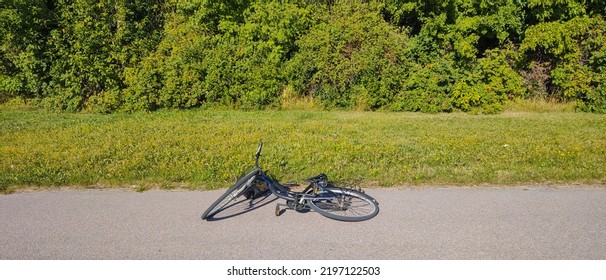 Fall Of Bicycle On The Road