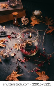 Fall candle decoration with dried leaves, autumn wooden home decor still life scented candle, autumn season interior decoration details - Shutterstock ID 2201573221