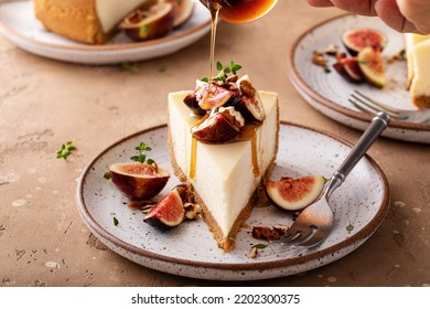 Fall cheesecake with figs, pecan nuts and maple syrup poured over - Powered by Shutterstock