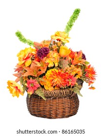 Fall Color Silk Flower Arrangement In Basket Isolated On White