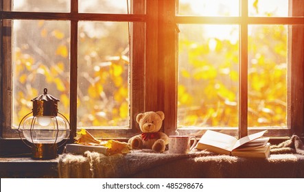 Fall. Cozy Window With Autumn Leaves, A Book, A Mug Of Tea