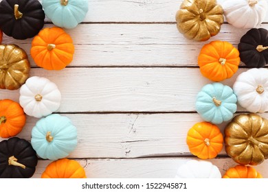 Fall Double Side Border Of Colorful Pumpkins. Above View Over A White Wood Background With Copy Space.