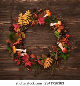 Fall Foliage Circular Frame on Vintage Wooden Background with Copy Space